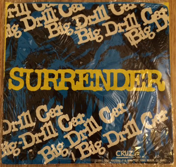 yellow_vinyl_cruz_big_drill_car_surrender_cover